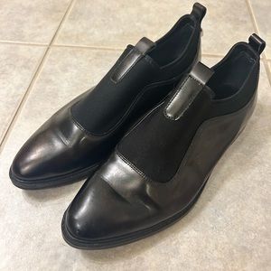 Black Calvin Klein Oxford loafers.